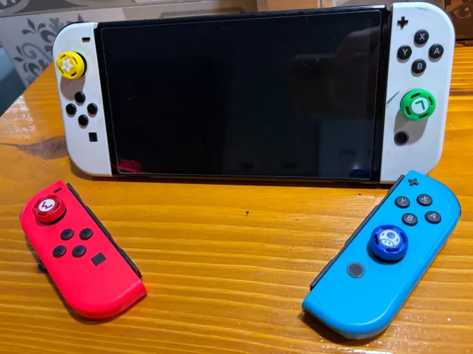 Nintendo Switch Oled + par de joycons extra + acessórios inclusos+ microsd 128gb