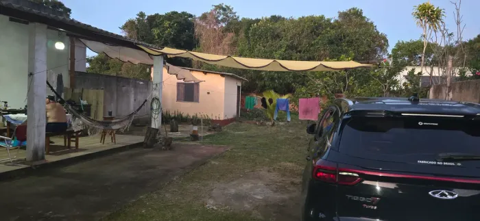 Terreno 540 metros quadrados com 02 casas e área de lazer com fogão a lenha