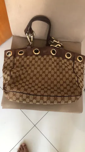 Bolsa Gucci.