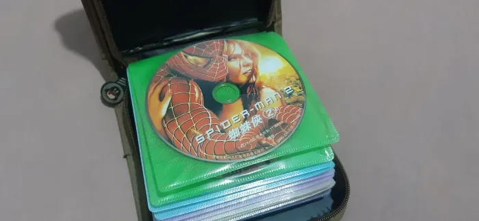 Lote com 31 DVDs + Pasta organizadora