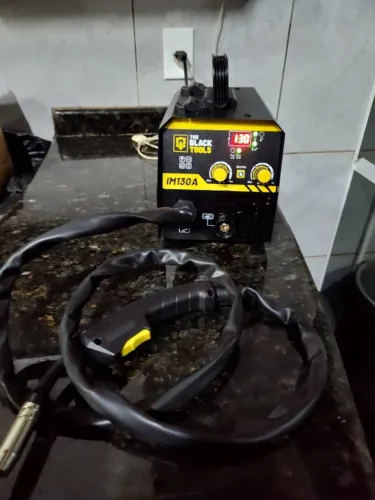 Máquina De Solda Inversora Mig 130a Sem Gás 220v Im130a Black Mig Cor Preto/amarelo