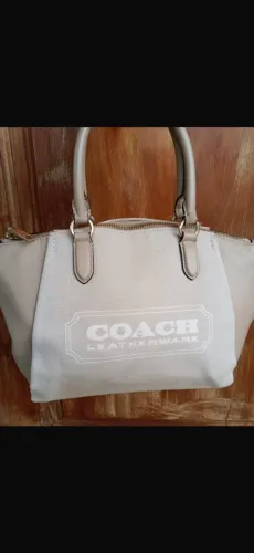 Bolsa coach original com código de veracidade