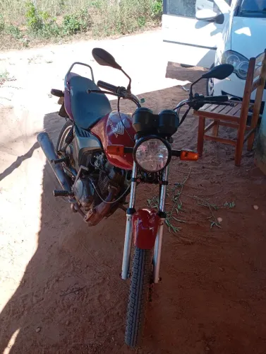 Vendo Fan 125 ano 2009 atrasada com documento