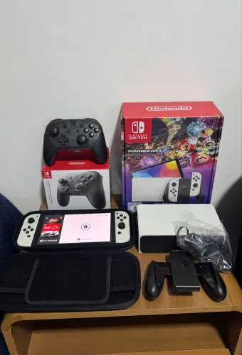 Nintendo Switch oled + cartão 128 GB( LEIA A DESCRIÇÃO)