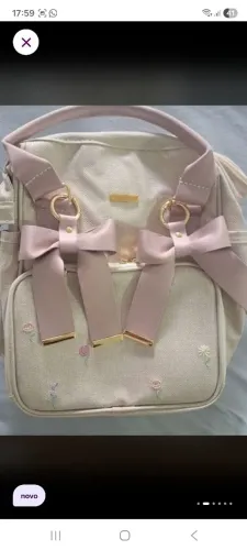 Mochila maternidade menina.
