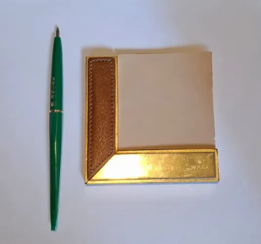 PORTA-PAPEL ROLEX ORIGINAL EM METAL E COURO - PEÇA VINTAGE PARA COLECIONADORES  
