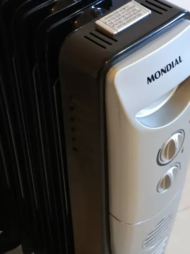 Aquecedor Mondial a óleo 1500W 127V ótimo