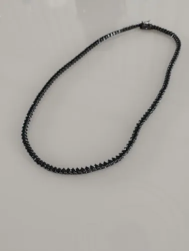 VENDO RIVIETA COM PEDRAS EM ZIRCONIA NEGRAS