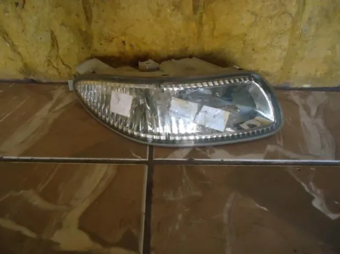 Farol de milha nissan maxima 2000