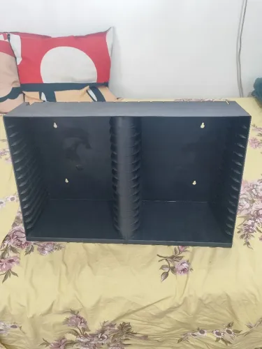 Porta dvd com capacidade de 30 unidades