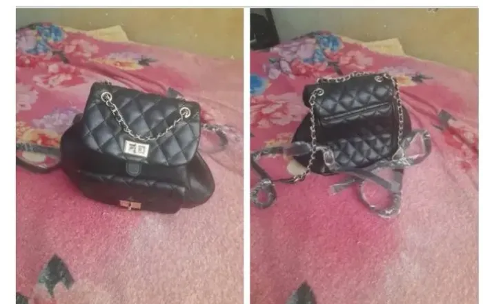 Mochila preta feminina com detalhes em corrente