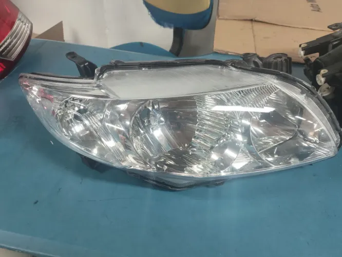 FAROL Corolla 2012/13 lado direito original 