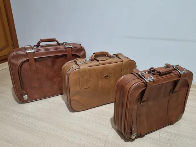 Mala de viagem vintage em couro marrom