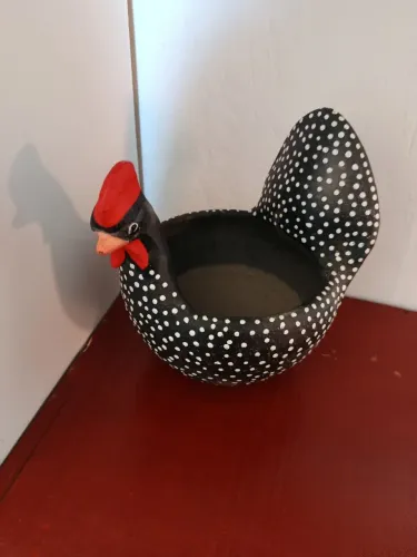 Galinha de barro pra por os ovos