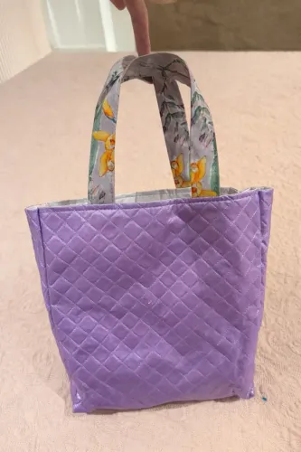 Vende-se bolsinha lilás semi usada