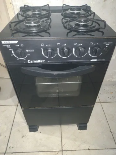 Fogão esmaltec 4 bocas todo de vidro lindo praticamente novo pra hj temos entrega não ele.