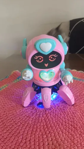 Robô aranha dançarino com luzes rosa