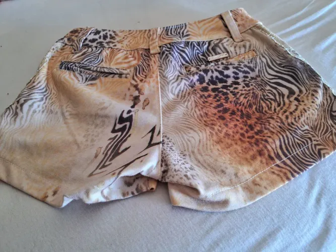 Short infantil onça 