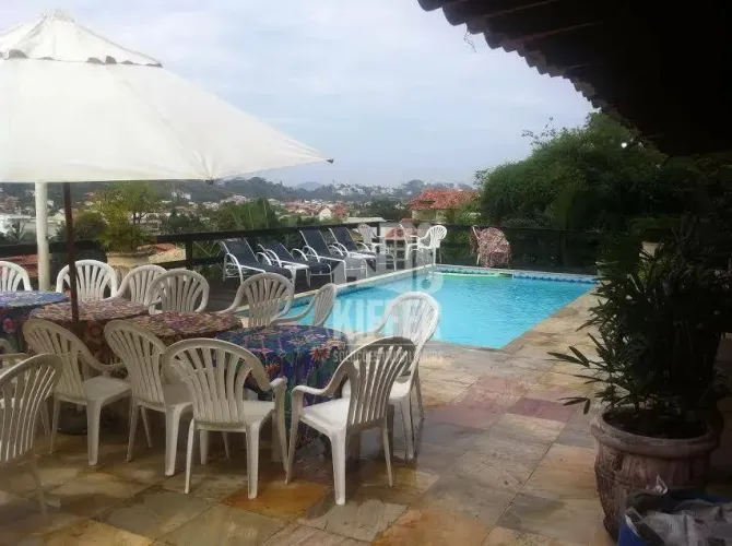 Casa em Condomínio com 4 Suítes | Piscina | Sauna | Lazer Completo