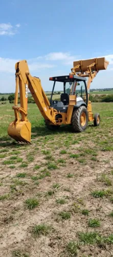 Retroescavadeira Case 580m