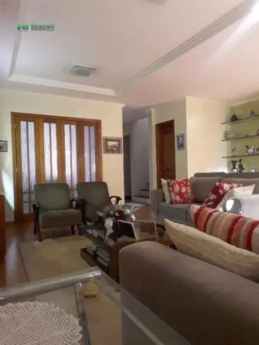 Sobrado com 3 dormitórios para alugar, 230 m² por R$ 4.841,61/mês - Jardim América - Taboã