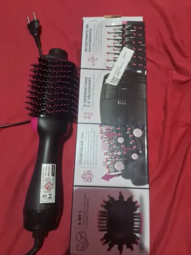Vendo essa escova modeladora secadora muito boa ..