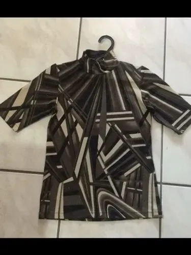 blusa em tecido lurex 