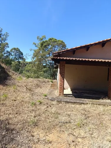 Vendo terreno com casa em construção Extrema MG 