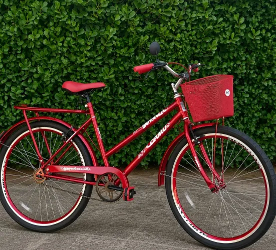 Bicicleta vermelha com nota