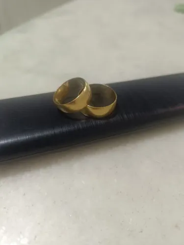 Par de alianças- usados- ouro 18k 6mm