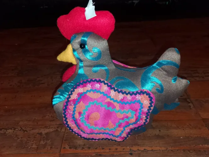 Galinha peso de porta