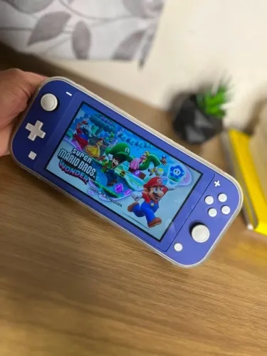 Nintendo Switch Lite 32GB + 128 GB Micro SD - DESBLOQUEADO-  Caixa e Capa protetora