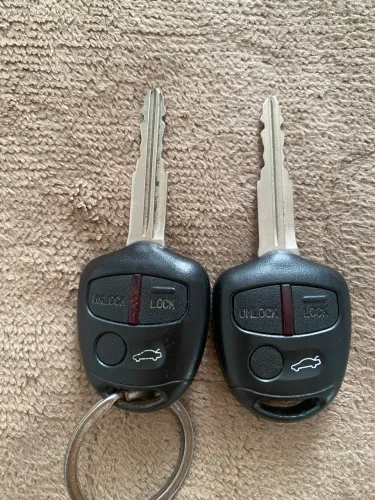 2 chaves ORIGINAIS do Lancer GT 2015/16, possuo nota fiscal!