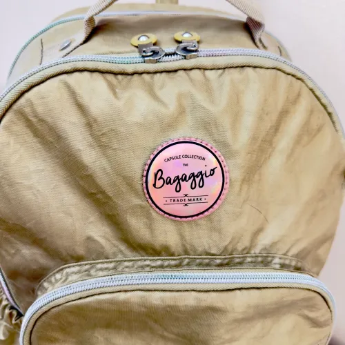 Mochila baggagio com rodinhas dourada praticamente nova