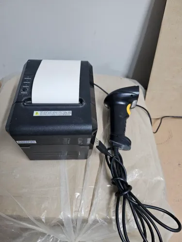 Impressora térmica + leitor de código de barras.