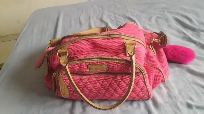Bolsa de mão viagem rosa