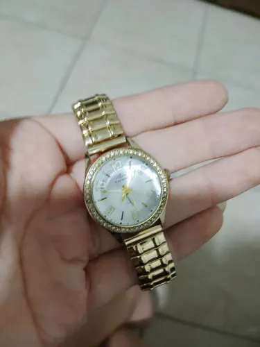 Relógio dourado Mulher Brilhante