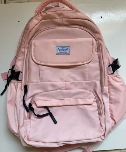 mochila rosa com espaço para notebook