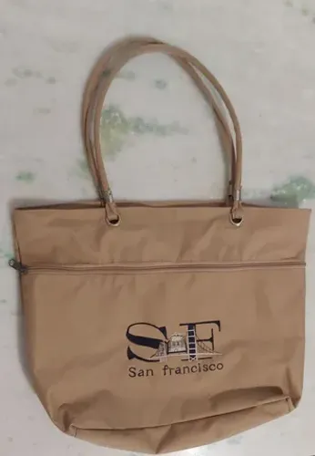 Bolsa tipo lona - importada