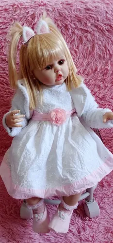 Bebê reborn membros de vinil e corpo de tecido