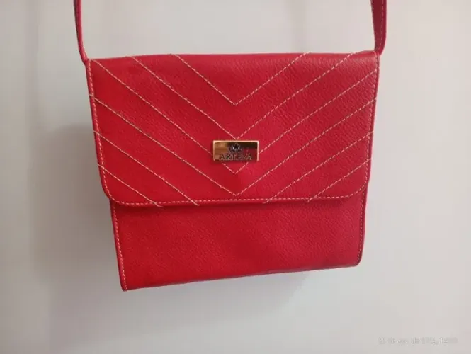 Excelente bolsa de couro nova!