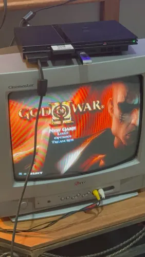 Play 2 com 65 jogos + TV tubo