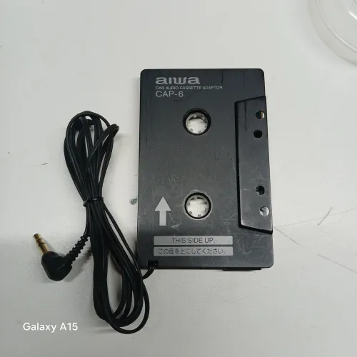 Vendo esse adaptador de cassete para audio de carro da marca Aiwa