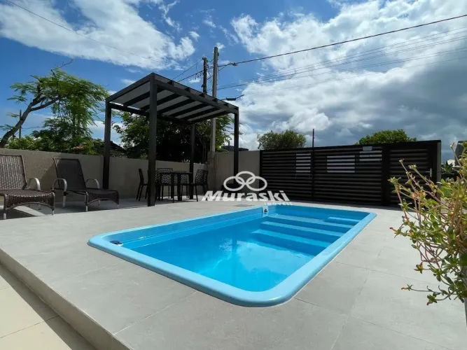 Casa com 3 dormitórios à venda, 107 m² por R$ 890.000,00 - Coroados - Guaratuba/PR