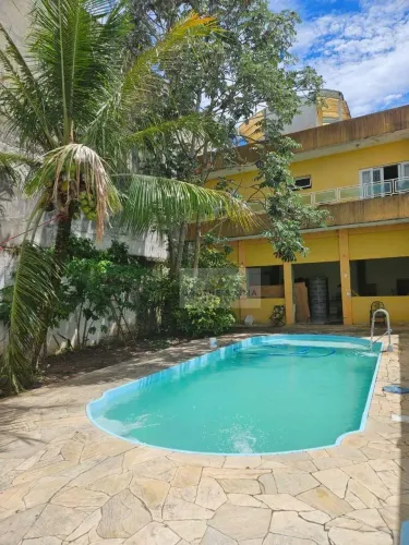 Sobrado com 4 dormitórios para alugar, 580 m² por R$ 3.800,00/mês - Vale das Flores - Trem