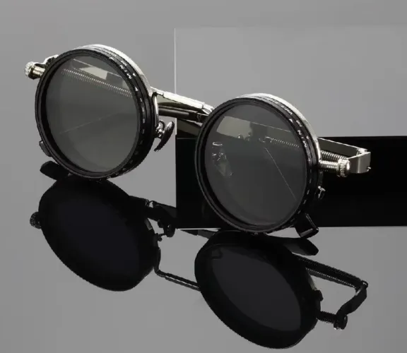 Óculos de Sol Retrô Punk com lentes polarizadas e escurecimento ajustável.