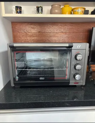 Forno Oster Elétrico 45L Completo R$439,99