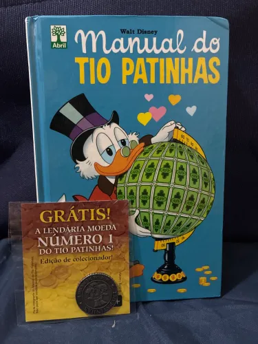 Manual do Tio Patinhas com moeda n°1