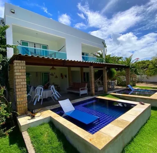 Vendo Terreno com 06 imóveis em Japaratinga