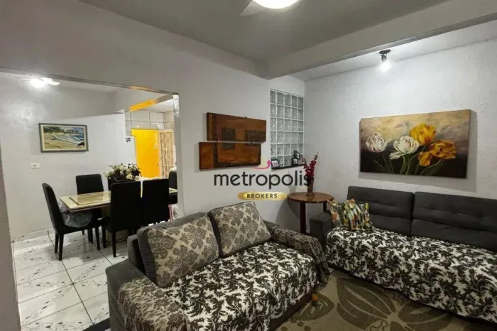 Casa com 3 dormitórios à venda, 138 m² por R$ 561.500,00 - Parque Erasmo Assunção - Santo